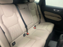 2026 VOLVO XC60 Plus model in Onyx Black with the Cardamon interior