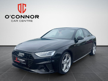 Audi A4 Black suit, Audi badge and effortless diesel power — executive motoring never goes out of style.