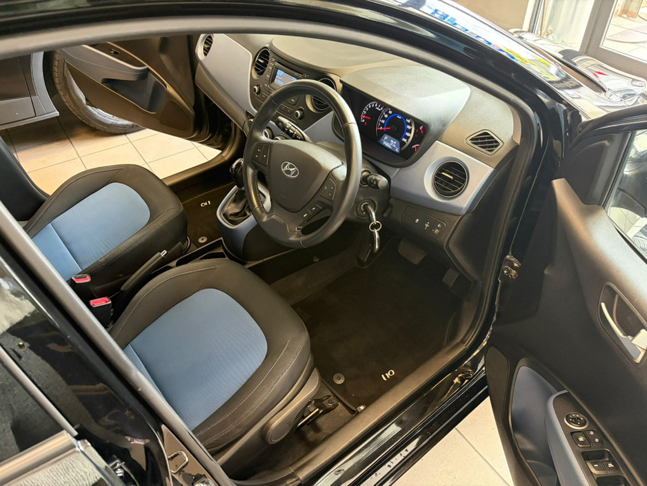 Hyundai i10 1.0 Deluxe Auto 4DR. Irish Car, NCT & TAX, 2Keys, Bluetooth, MFSW, Air Conditioning, Irish Radio, Alloy Wheels, Folding Rear Seats, Luggage Cover, USB/AUX and more. — thumbnail 16