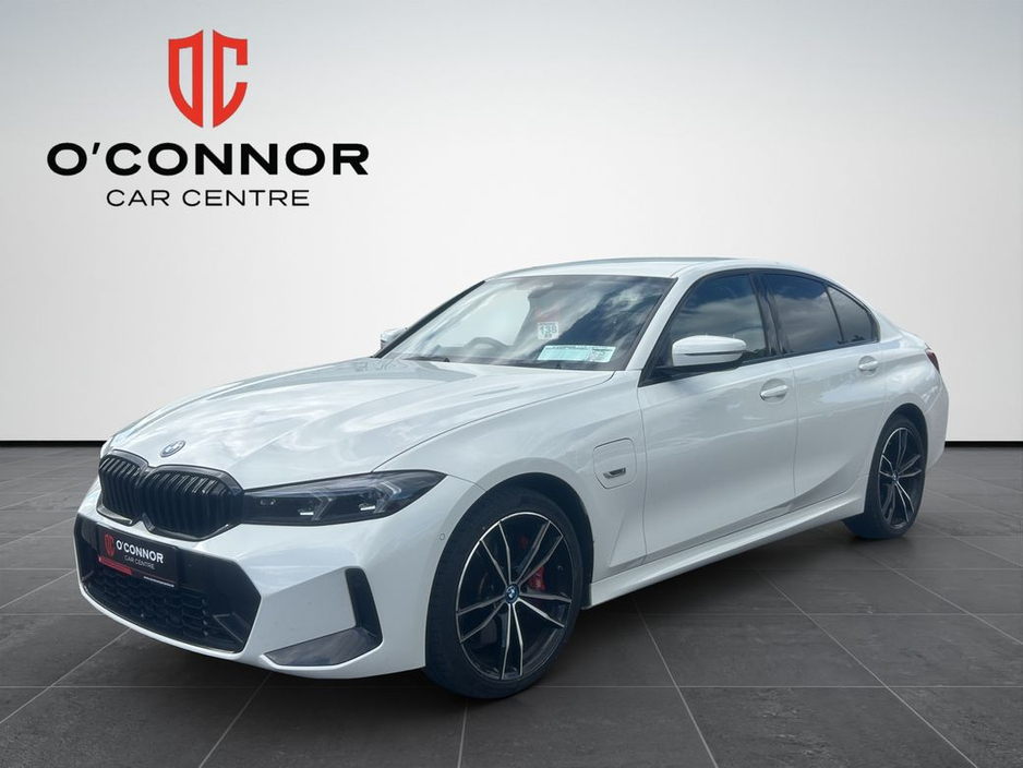 BMW 3 Series White outside, Tacora Red inside — subtle was never the plan.