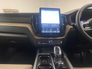 2026 VOLVO XC60 Plus model in Onyx Black with the Cardamon interior
