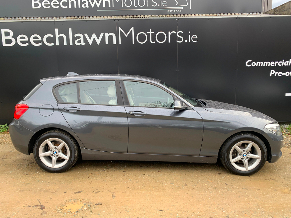 BMW 1 Series 116D SE AUTOMATIC // GREAT CONDITION // FULL SERVICE HISTORY // LEATHER, SAT NAV AND PARKING SENSORS // €200 ROAD TAX // 07/28 NCT // — thumbnail 2