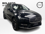 2026 VOLVO XC60 Plus model in Onyx Black with the Cardamon interior