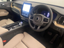 2026 VOLVO XC60 Plus model in Onyx Black with the Cardamon interior
