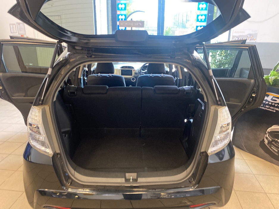 Honda Fit 1.3 HYBRID 5DR AUTO. Immaculate Car with only 108km, 2 Keys, NCT done before collection, Irish Radio with Bluetooth and Media, Climate Control, Cruise Control, Full Electrics and much more. — thumbnail 22
