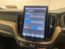 2026 VOLVO XC60 Plus model in Onyx Black with the Cardamon interior