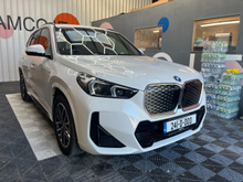 BMW iX1 2024 BMW IX1 4WD XDRIVE 30 M-SPORT 11K KM AUTOMATIC/ CRUISE CONTROL / PARKINNG CAMERA / ELECTRIC MEMORY & HEATED SEATS / AMBIENT LIGHTS / PADDLE SHIFTERS AND MORE