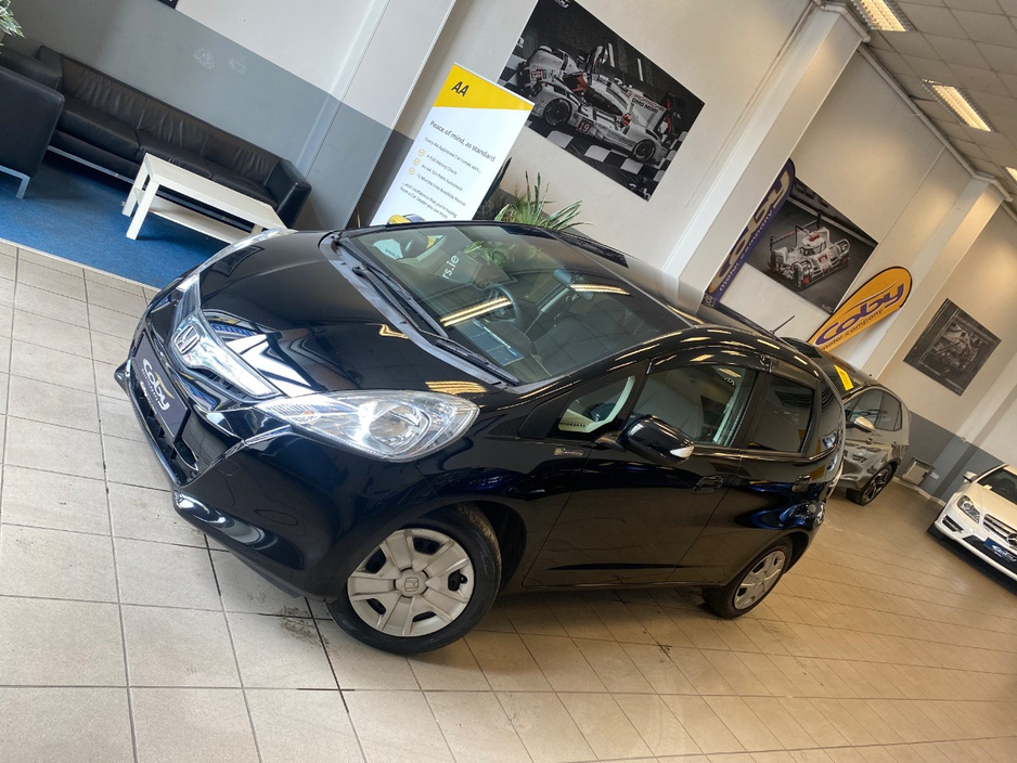 Honda Fit 1.3 HYBRID 5DR AUTO. Immaculate Car with only 108km, 2 Keys, NCT done before collection, Irish Radio with Bluetooth and Media, Climate Control, Cruise Control, Full Electrics and much more. — thumbnail 7