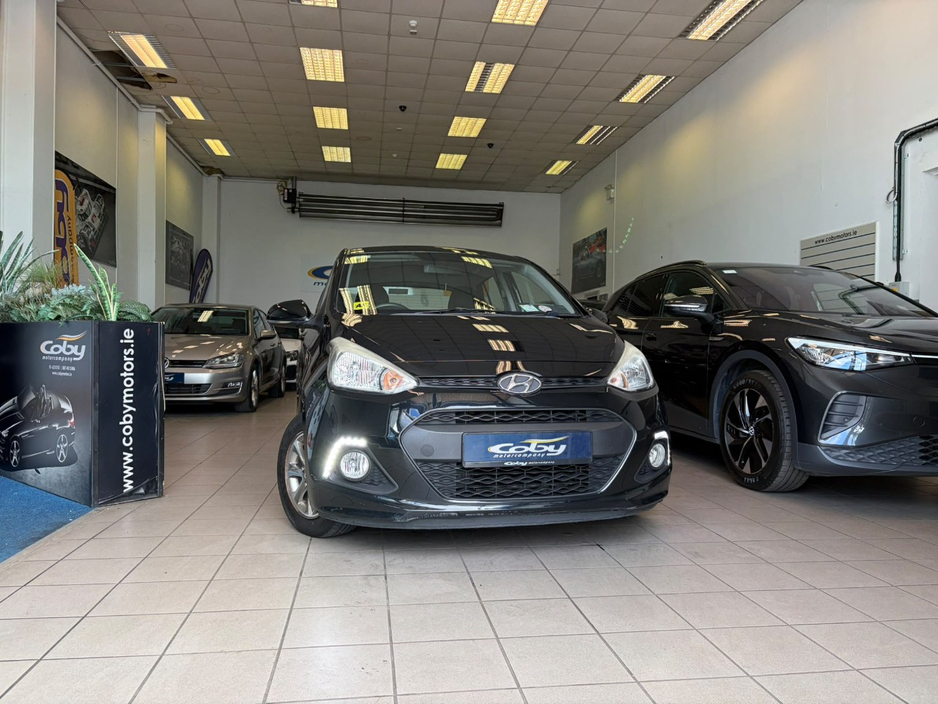 Hyundai i10 1.0 Deluxe Auto 4DR. Irish Car, NCT & TAX, 2Keys, Bluetooth, MFSW, Air Conditioning, Irish Radio, Alloy Wheels, Folding Rear Seats, Luggage Cover, USB/AUX and more. — thumbnail 6