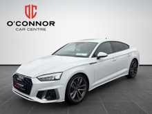 Audi A5 Sharp enough for the boardroom. smooth enough for the long way home.