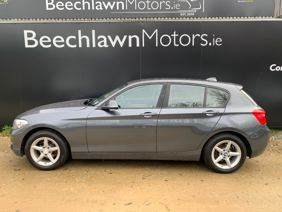 BMW 1 Series 116D SE AUTOMATIC // GREAT CONDITION // FULL SERVICE HISTORY // LEATHER, SAT NAV AND PARKING SENSORS // €200 ROAD TAX // 07/28 NCT // — thumbnail 7